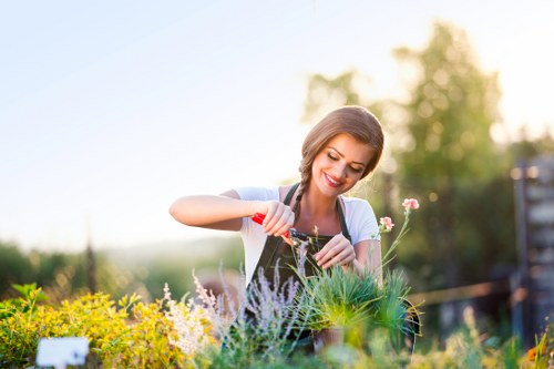 Garden maintenance work in Harmondsworth with neatly trimmed lawns and borders