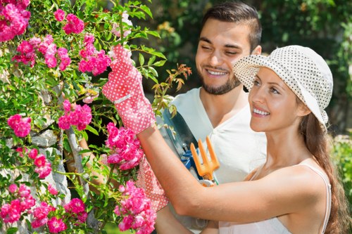 Professional lawn mowing in Harmondsworth on a neatly maintained garden